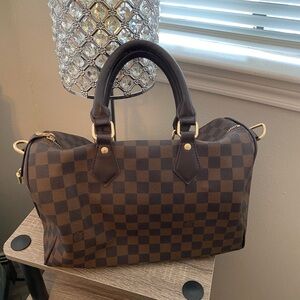Checkered Brown Handbag with Gold Accents